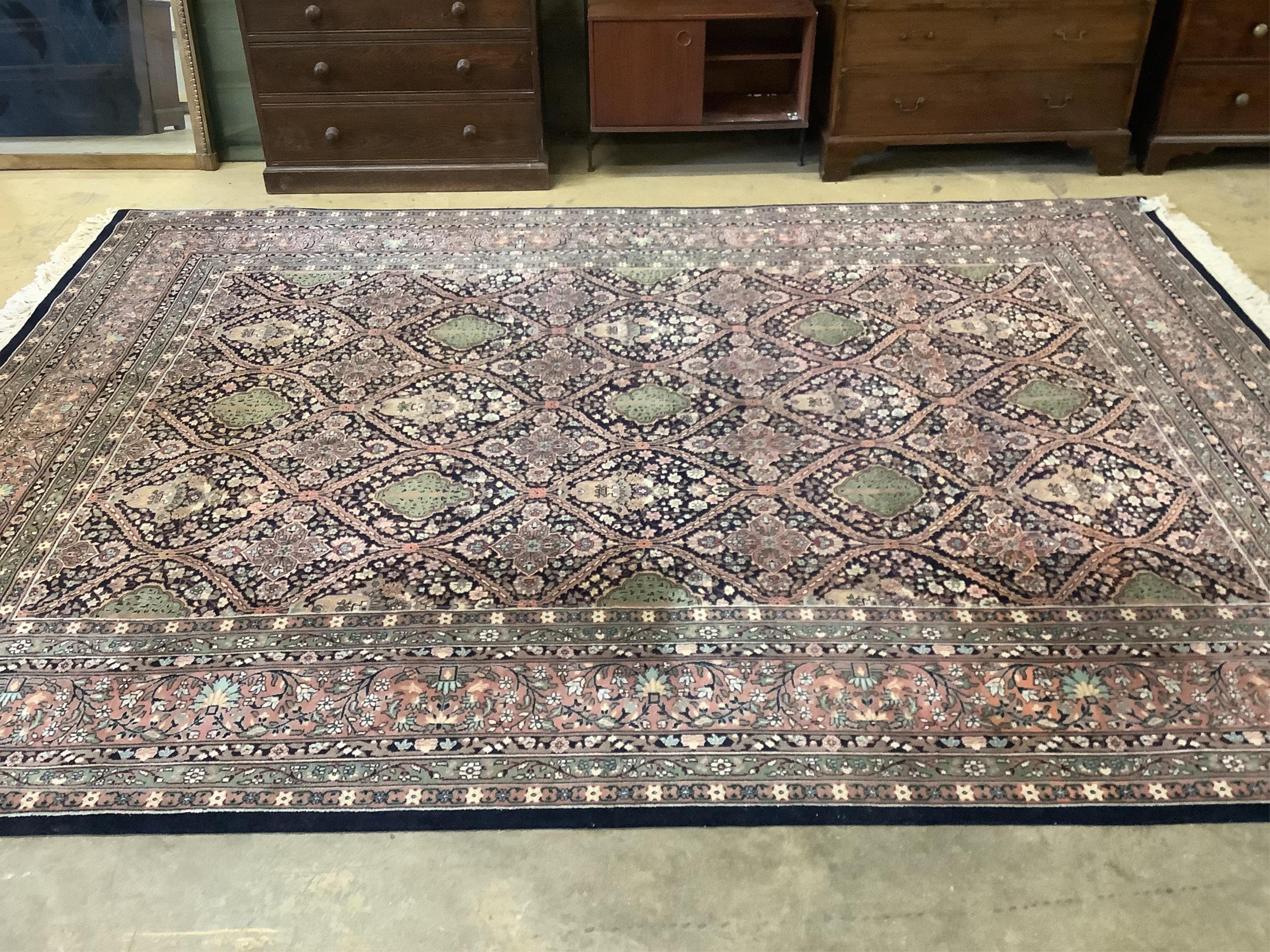 An Indian wool carpet, 372 x 274cm. Condition - good